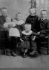 Manley, Edith, Elsie, Ray (in dress), Earle, Otis and Edith Bates